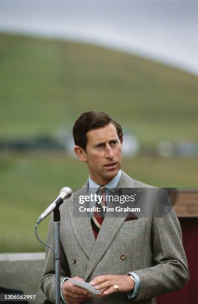 British Royals Charles, Prince of Wales delivers a speech during a visit to the RNLI lifeboat station in Aith on Shetland Mainland, Scotland, 25th...