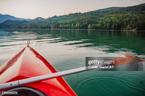 recreation in a kayak on the lake - boat in lake stock pictures, royalty-free photos & images