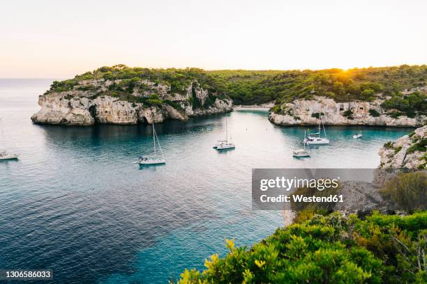 scenic view of sea against clear sky during sunset - menorca stockfoto's en -beelden
