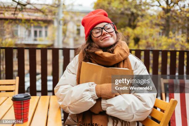 Hugging Books 6,785 Woman Hugging Book Stock Photos, High-Res Pictures, and Images ...