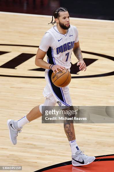 Michael Carter-Williams of the Orlando Magic dribbles up the court ...