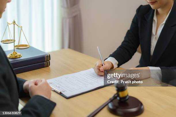 customer service good cooperation, consultation between a businessman and male lawyer or judge consult having team meeting with client, law and legal services concept. - notaio foto e immagini stock