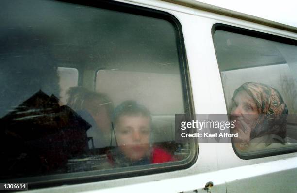 Albanian refugees from the Presevo valley in southern Serbia enter the American KFOR controlled sector of Kosovo at the Mucibaba border crossing...