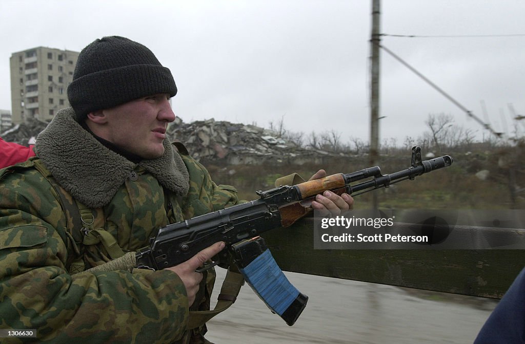 Russian Troops Patrol in Ruins of Grozny