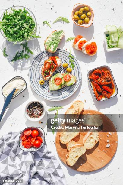 a variety of healthy toasts with vegetables, seeds and microgreens. - healthy dishes no people stockfoto's en -beelden