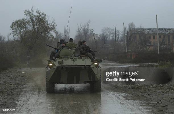 Russian troops patrol in central Grozny November 23 capital of the breakaway republic of Chechnya. Russian forces have been accused of massive human...