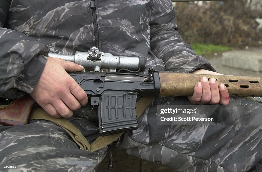 Russian Troops Patrol in Ruins of Grozny