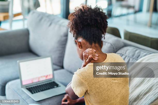 skip the sofa, use an ergonomic chair - shoulder injury stock pictures, royalty-free photos & images