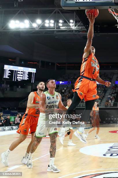 Scott Machado of the Taipans drives to the basket during the NBL Cup match between the Cairns Taipans and the South East Melbourne Phoenix at John...