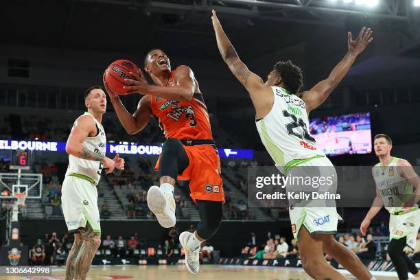 Scott Machado of the Taipans drives to the basket during the NBL Cup match between the Cairns Taipans and the South East Melbourne Phoenix at John...