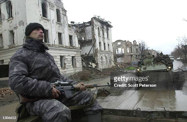 Russian troops patrol in central Grozny November 23 capital of the breakaway republic of Chechnya. Russian forces have been accused of massive human...