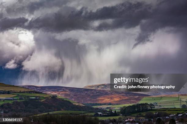 squally weather across kinder scout estate and the peak district national park. - extreme weather uk stock pictures, royalty-free photos & images