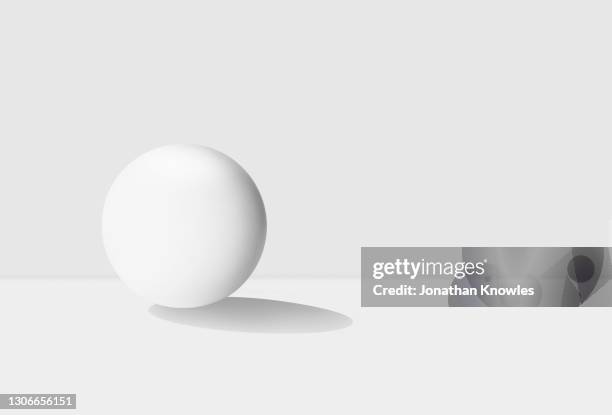 white orb - spielball stock-fotos und bilder