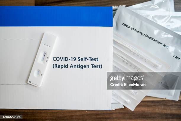 a close up of a lateral flow home testing kit - coronavirus stock pictures, royalty-free photos & images