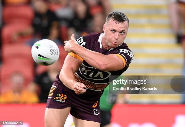 Jake Turpin of the Broncos passes the ball during the round one NRL match between the Brisbane Broncos and the Parramatta Eels at Suncorp Stadium, on...