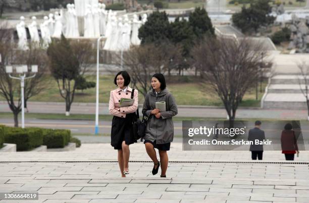 north korean students going to the library - north korea capital stock pictures, royalty-free photos & images