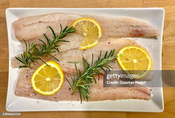 alaskan cod fillet - cod dinner stock pictures, royalty-free photos & images