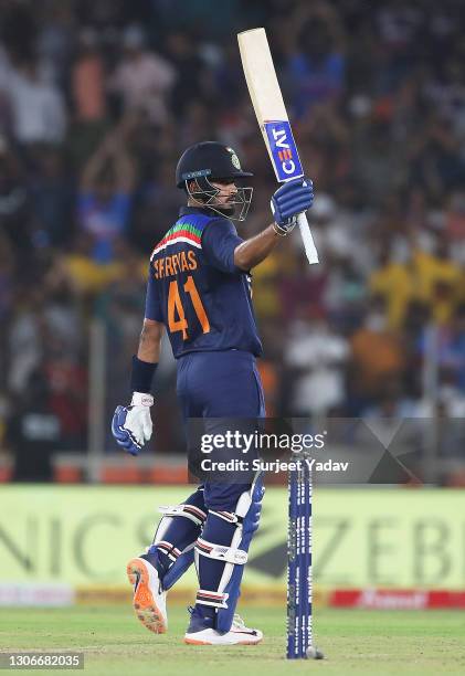 Shreyas Iyer of India celebrates after reaching their half century during the 1st T20 International match between India and England at Sardar Patel...