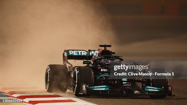 Lewis Hamilton of Great Britain driving the Mercedes AMG Petronas F1 Team Mercedes W12 kicks up sand during Day One of F1 Testing at Bahrain...