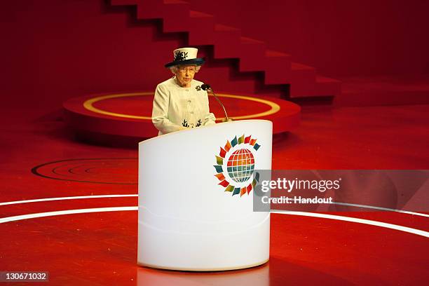 In this handout image provided by CHOGM, Queen Elizabeth II opens CHOGM 2011 at the Opening Ceremony at the Commonwealth Heads of Government Meeeting...