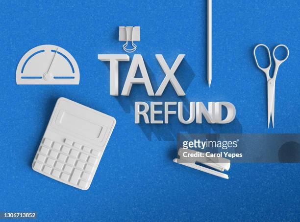 white calculator and pencil and some clips in white.tax refund concept - tax reform stock-fotos und bilder