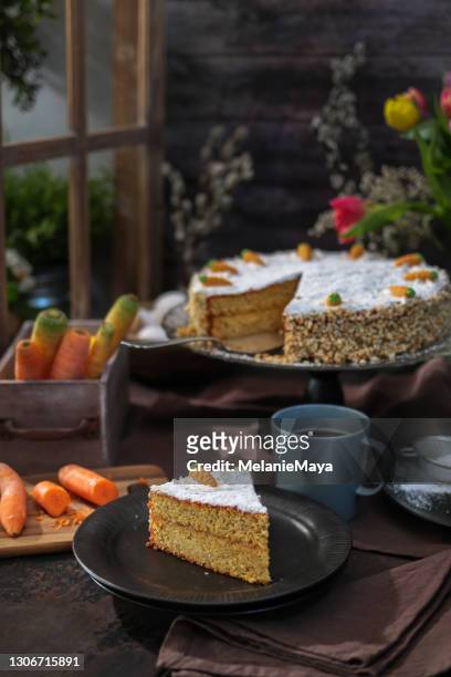 carrot cake in rustic barn kitchen with spring tulips for easter brunch - carrot cake stock pictures, royalty-free photos & images
