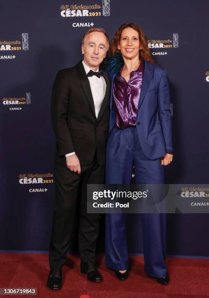 Sebastien Lifshitz and Muriel Meynard arrive at the 46th Cesar Film Awards Ceremony At L'Olympia on March 12, 2021 in Paris, France.