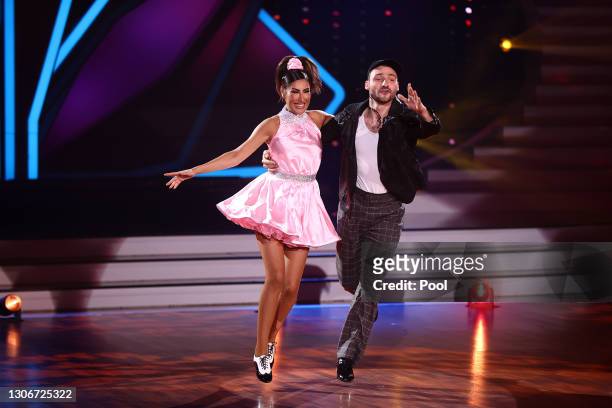 Senna Gammour and Robert Beitsch perform on stage during the 2nd show of the 14th season of the television competition "Let's Dance" on March 12,...
