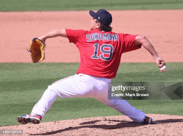 Hirokazu Sawamura of the Boston Red Sox delivers a pitch in the fifth inning against the Tampa Bay Rays in a spring training game at JetBlue Park at...