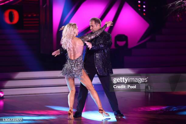 Kai Ebel and Kathrin Menzinger perform on stage during the 2nd show of the 14th season of the television competition "Let's Dance" on March 12, 2021...