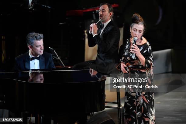 Benjamin Biolay and Catherine Ringer perform during the 46th Cesar Film Awards Ceremony At L'Olympia In Paris on March 12, 2021 in Paris, France.