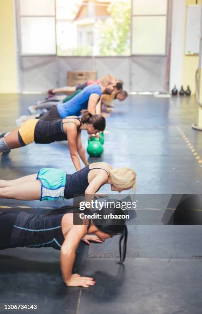 group training push-ups - press ups stock pictures, royalty-free photos & images