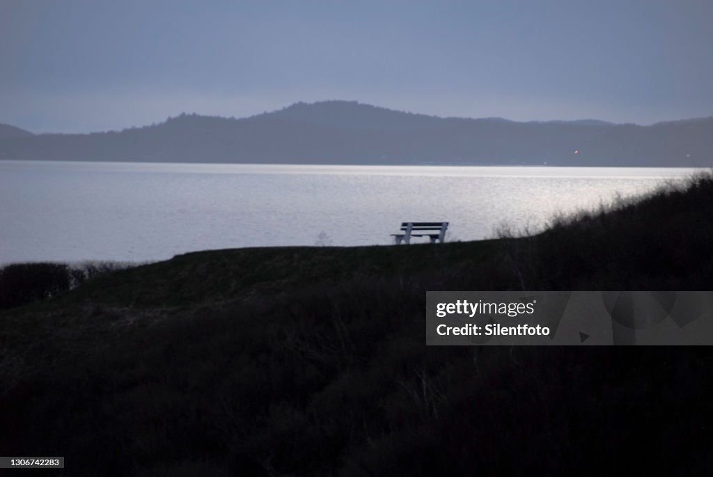 Empty Bench Overlooking Sea