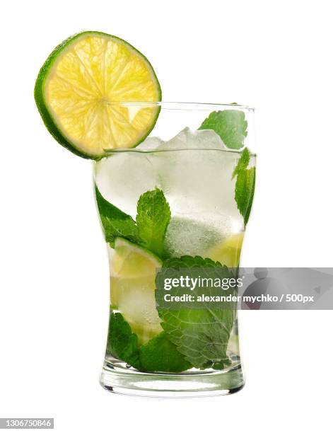 close-up of drink against white background - caipirinha stock-fotos und bilder