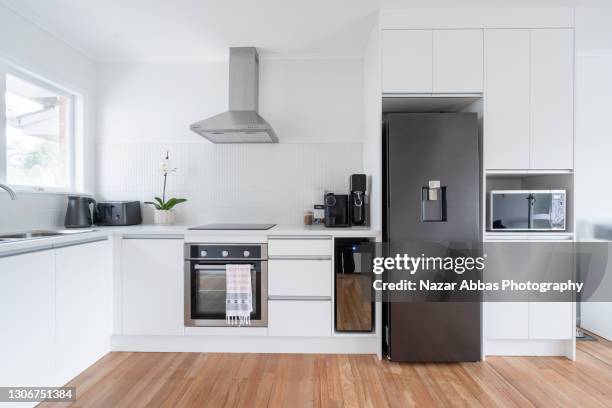 open bright kitchen. - refrigerator stock pictures, royalty-free photos & images