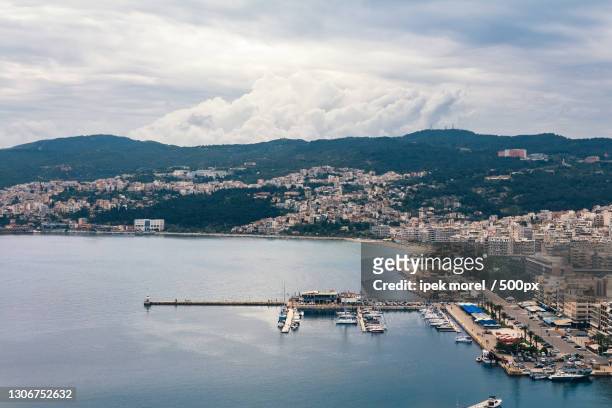 high angle view of city by sea against sky - ipek morel stock pictures, royalty-free photos & images