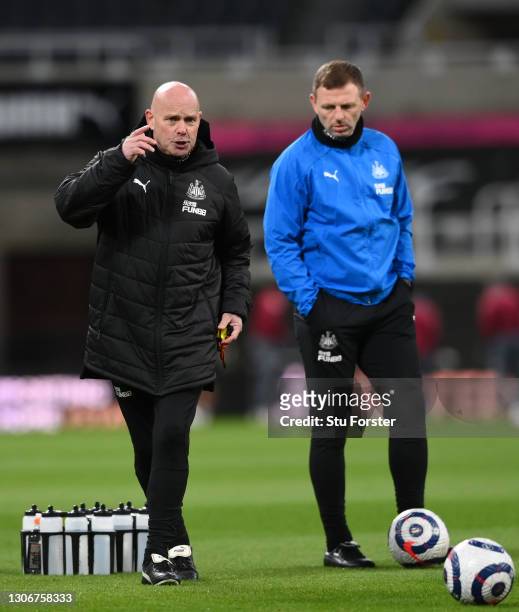 Newcastle coach Steve Agnew takes the players warm up with Graeme Jones before the Premier League match between Newcastle United and Aston Villa at...