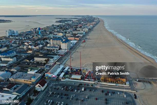 In an aerial view from a drone, the Ocean City inlet and Ocean City boardwalk is seen on March 12, 2021 in Ocean City, Maryland.