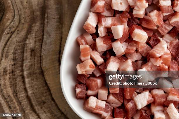 close-up of chopped sugar in bowl on table - pancetta stock pictures, royalty-free photos & images