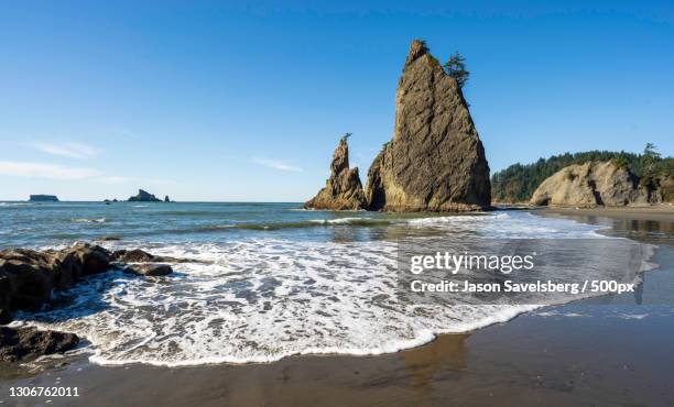 scenic view of sea against clear blue sky,rialto beach,washington,united states,usa - rialto beach stock pictures, royalty-free photos & images