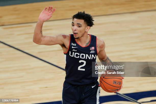 James Bouknight of the Connecticut Huskies calls a play in the first half against the Creighton Bluejays during the Semifinals of the Big East...