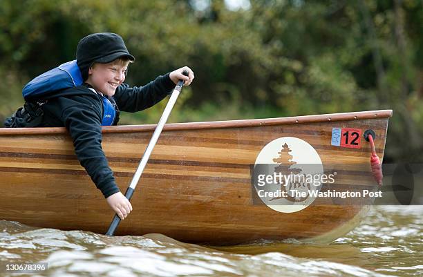 Third grader Hayden Detenberg enjoys paddling with classmates on the waters of Anacostia River in Washington, DC on October 26, 2011. He and other...