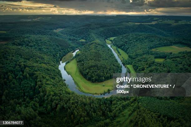 aerial view of green landscape and river,bouillon,belgium - belgium aerial stock pictures, royalty-free photos & images