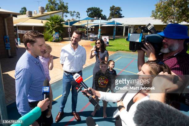 Federal Minister Andrew Hastie is seen with WA Liberal Candidate Zak Kirkup speaking to media at Glencoe Primary School on March 13, 2021 in Halls...