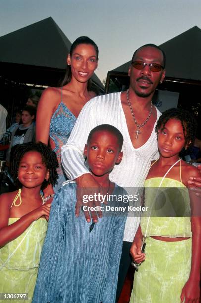 Eddie Murphy with his wife, Nicole and their kids arrive at the premiere of his new movie, "Nutty Professor 2: The Klumps" July 25, 2000 in Universal...