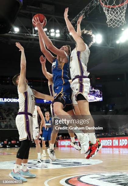 Matthew Hodgson of the Bullets drives at the basket during the NBL Cup match between the Brisbane Bullets and the Sydney Kings at John Cain Arena on...