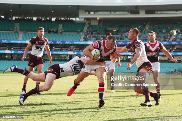Brett Morris of the Roosters scores a try during the round one NRL match between the Sydney Roosters and the Manly Sea Eagles at the Sydney Cricket...
