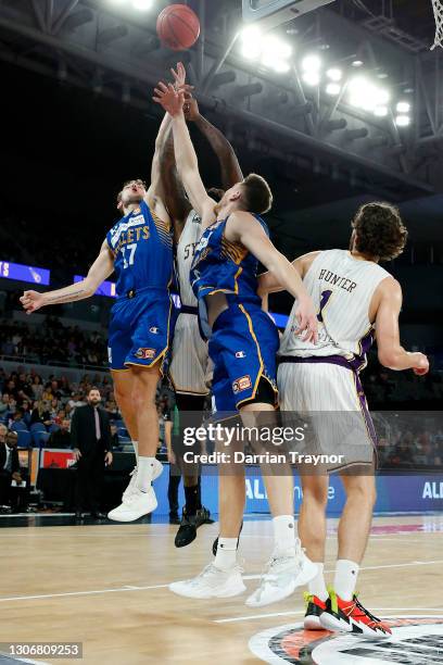 Tanner Krebs of the Bullets and Jarell Martin of the Kings compete for the rebound during the NBL Cup match between the Brisbane Bullets and the...