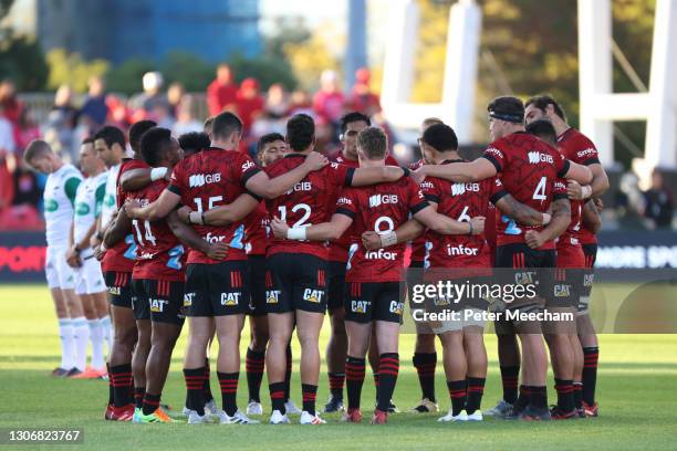 The Crusdaers during the moment of silence to commemorate the 2019 mosque attacks during the round three Super Rugby Aotearoa match between the...