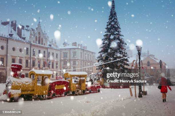 snowing in rzeszow - christmas town stock pictures, royalty-free photos & images